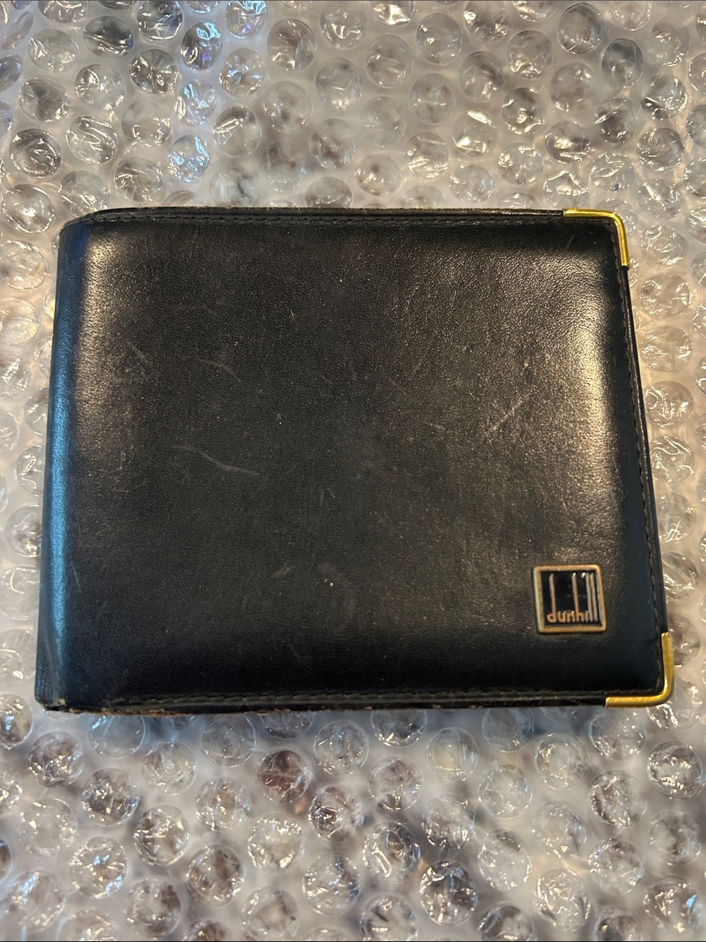 Dunhill Black Leather Bifold Wallet with Gold Corner Accents
